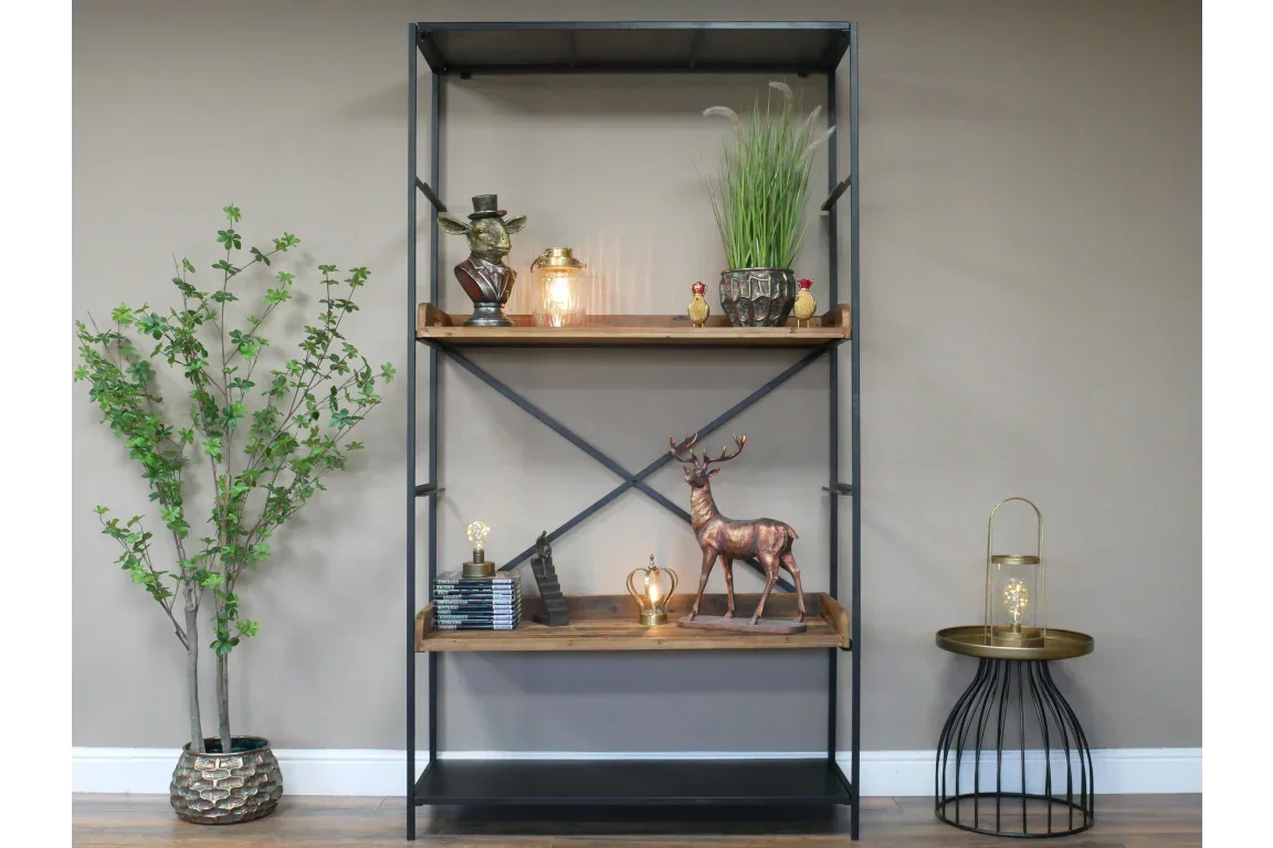 Industrial metal and wood shelving unit with ornaments and decorative accessories displayed
