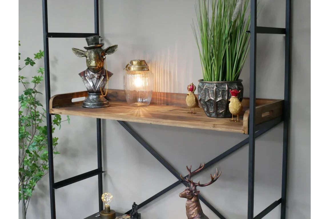 Wooden shelf with metal frame holding decorative lamp, potted plant, and animal ornaments