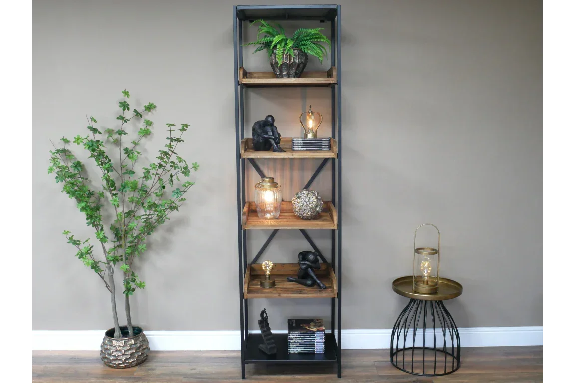 Tall industrial bookcase with black metal frame and wooden shelves, styled with decor items