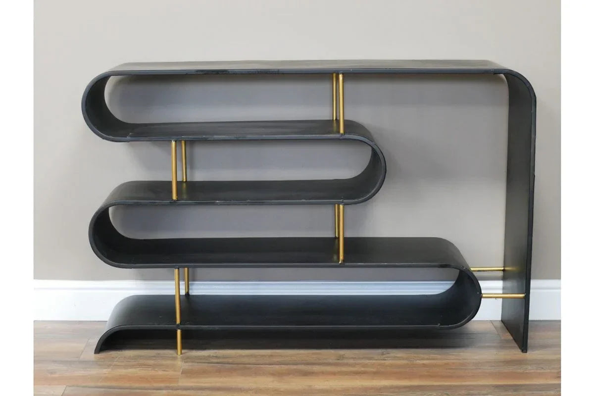 Black metal console table with gold supports and three-tier curved shelving