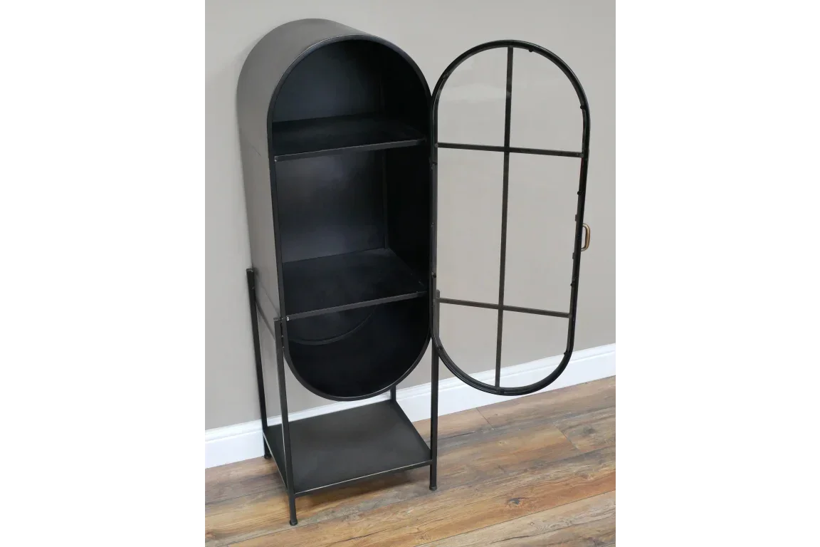 Black metal storage cabinet with arched glass door and shelves, shown open against wall