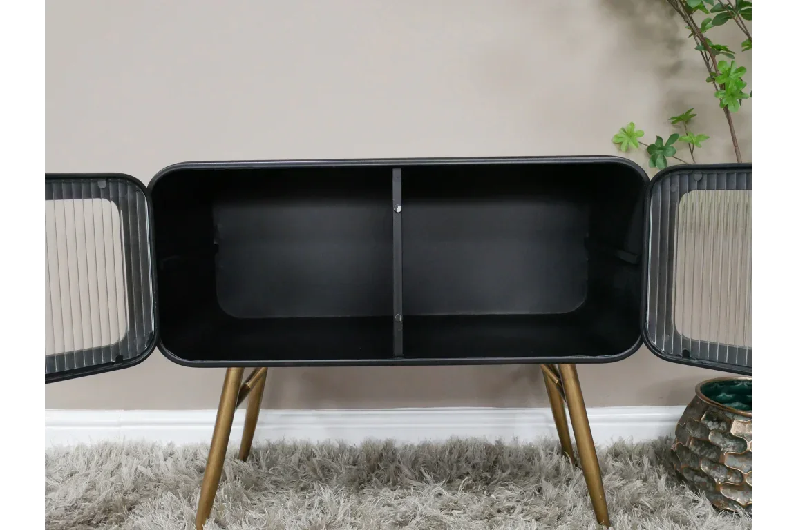 Black metal sideboard cabinet with glass doors and gold legs on grey rug