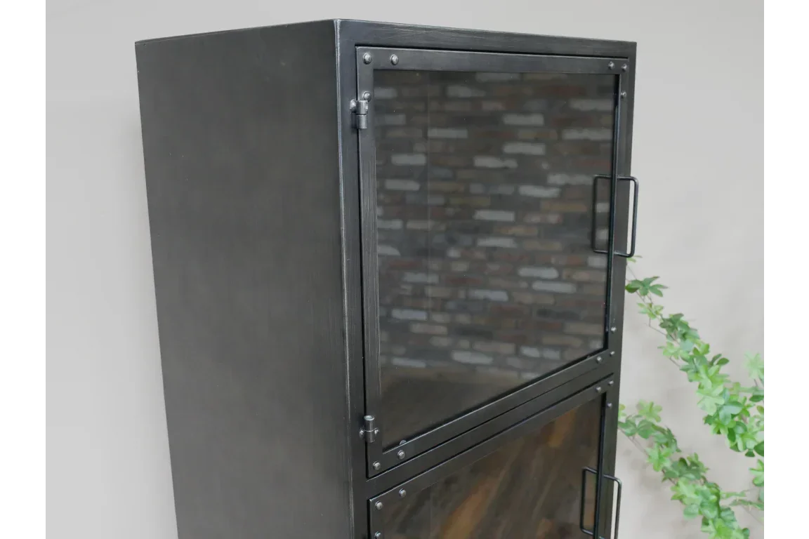 Black metal display cabinet with glass doors and handles, close view of upper section