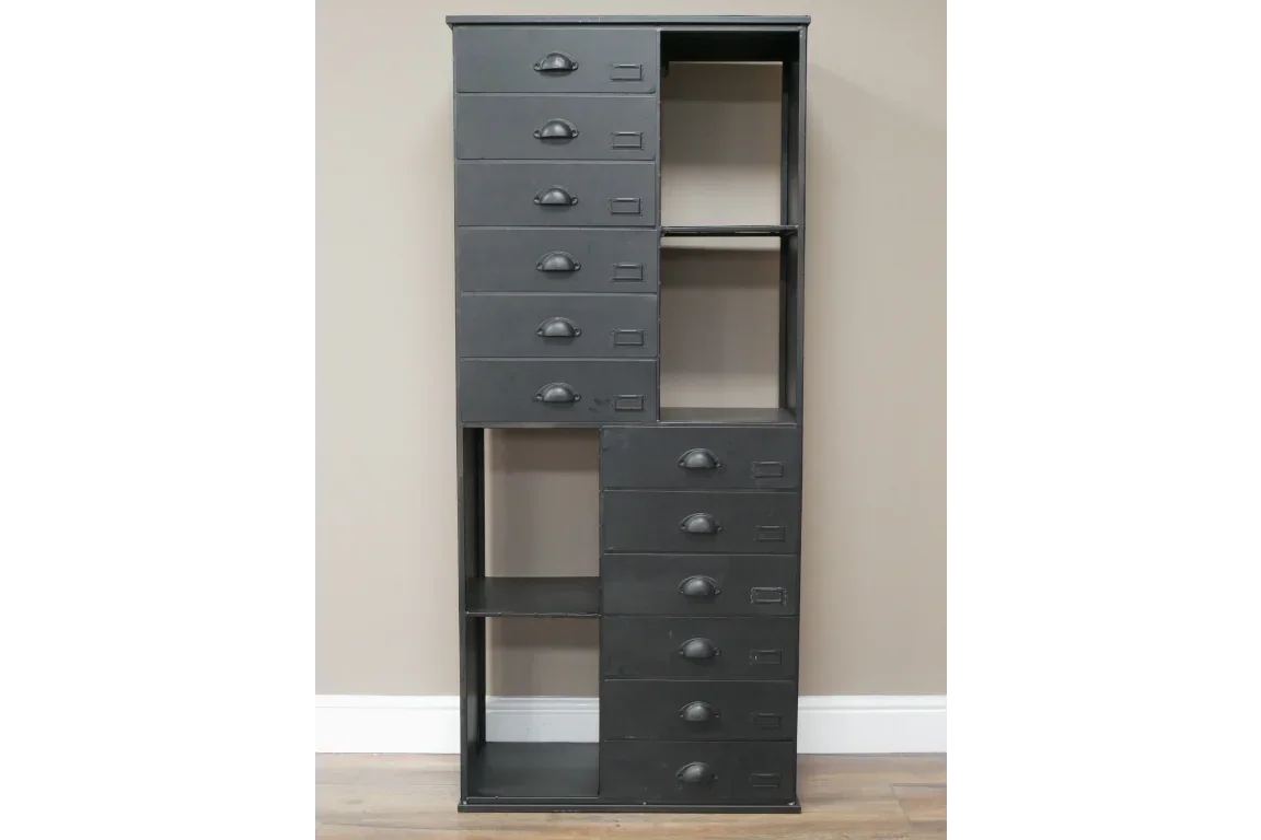 Tall black storage cabinet with multiple drawers and open shelving against neutral wall