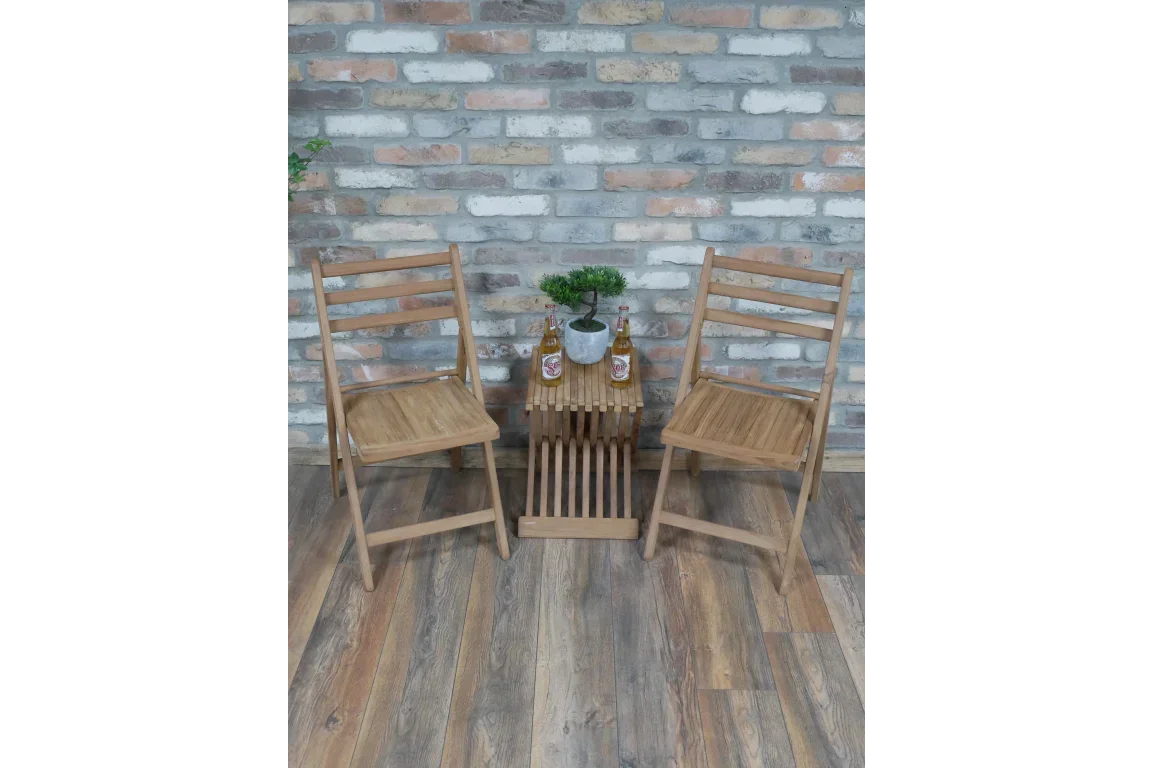 Wooden garden bistro set with two folding chairs and slatted side table on wood floor