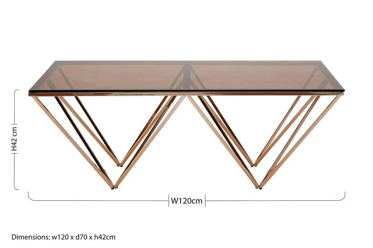 Rectangular glass coffee table with gold geometric metal base, 120cm wide by 42cm high