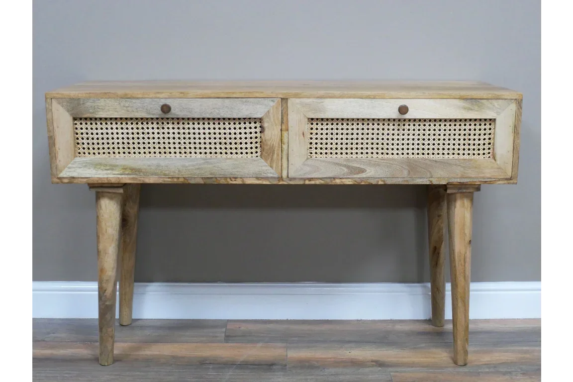 Natural wood console table with two rattan drawers and tapered legs, front view