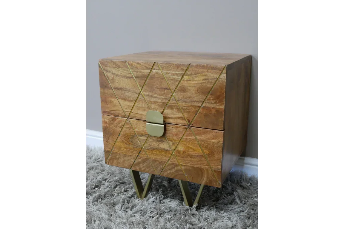 Wooden bedside table with gold metal legs and geometric pattern, two drawers visible