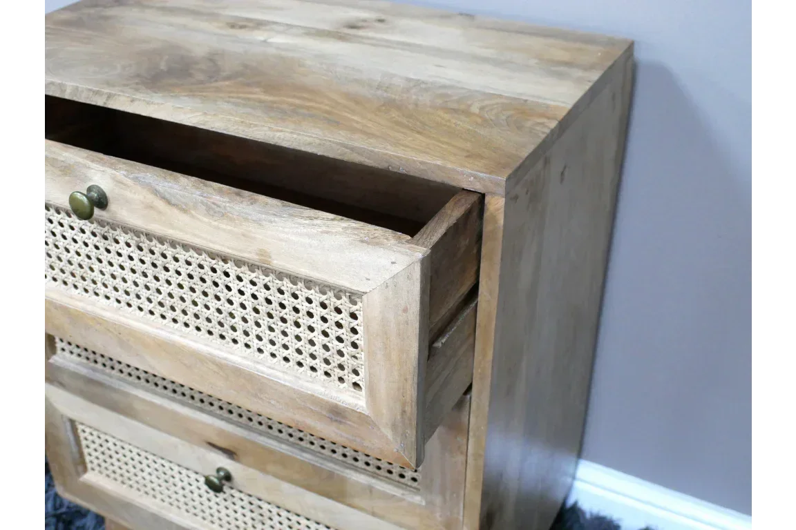 Wooden chest of drawers with cane front and open drawer, natural finish