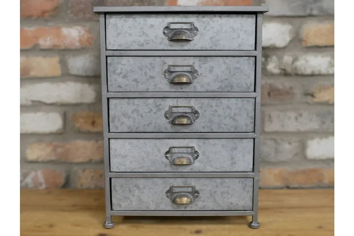 Galvanized metal chest of drawers with five compartments and brass cup handles