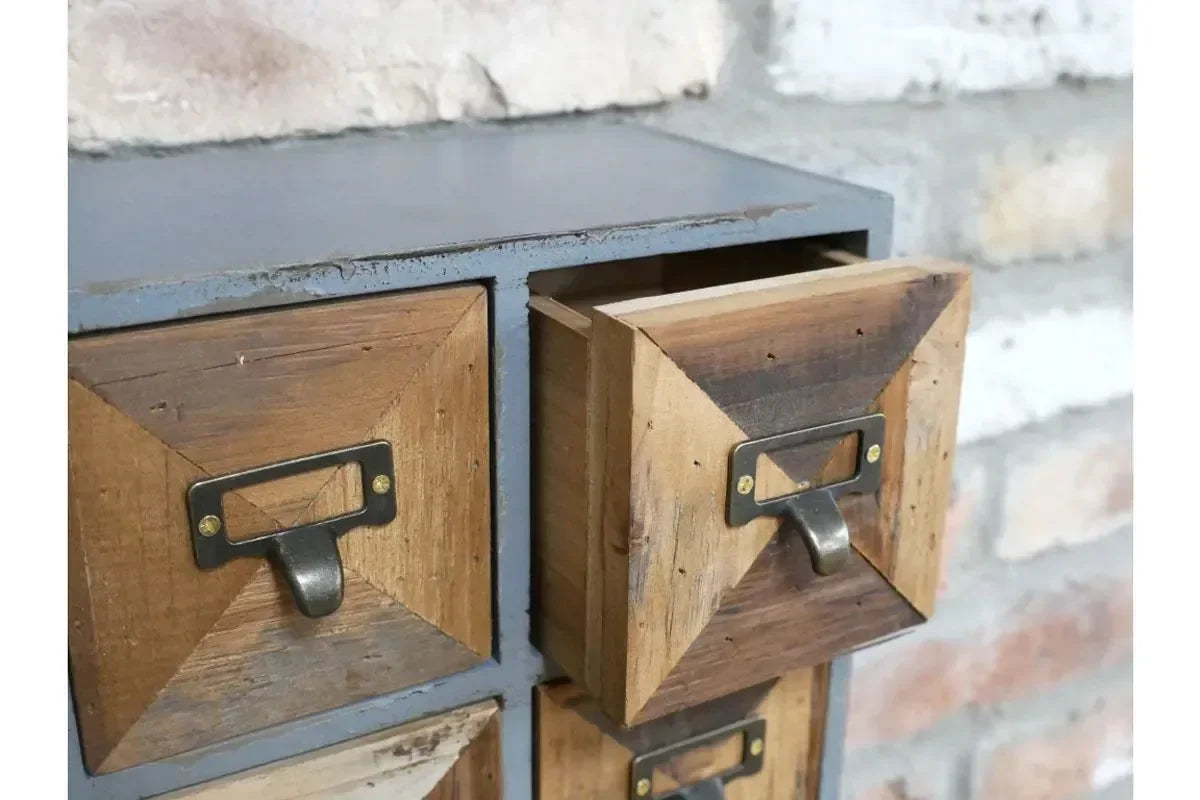 Industrial wooden storage drawers with metal handles, one drawer partially open