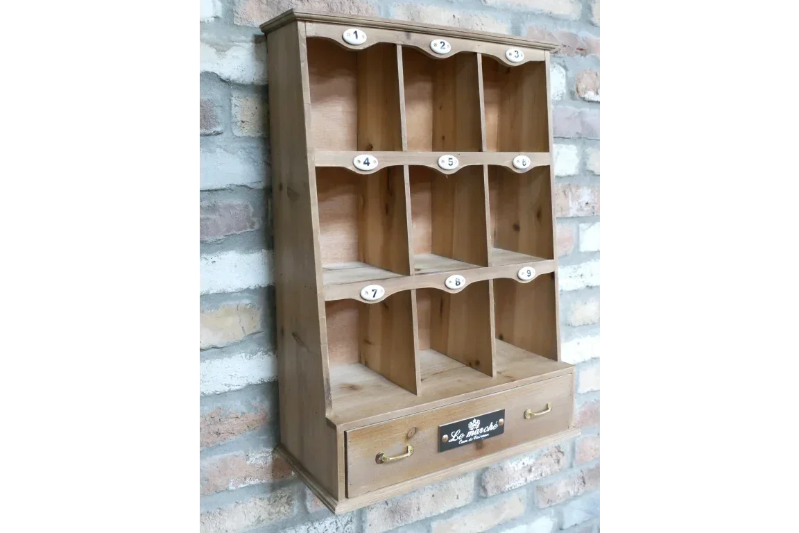 Wall-mounted wooden storage organiser with nine numbered cubby holes and single drawer