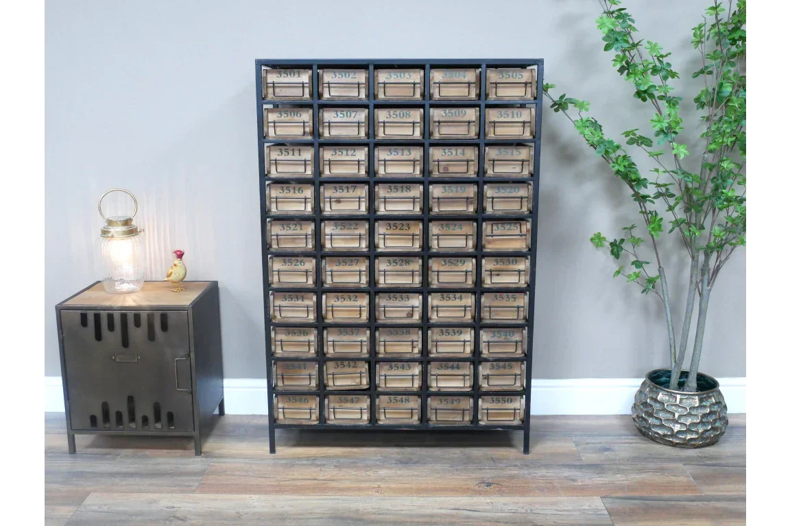 Industrial multi-drawer storage cabinet with numbered wooden drawers against a grey wall