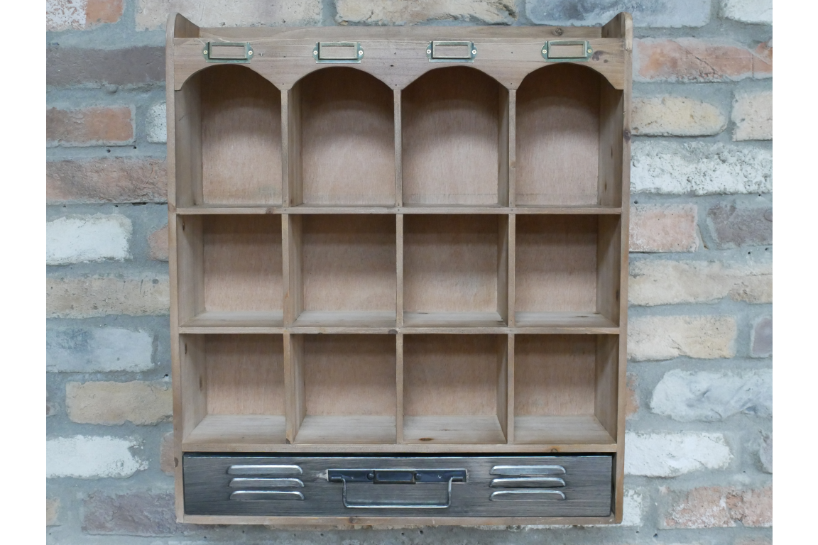 Wooden wall unit with twelve compartments, metal drawer at bottom, and metal label holders on top, front view.