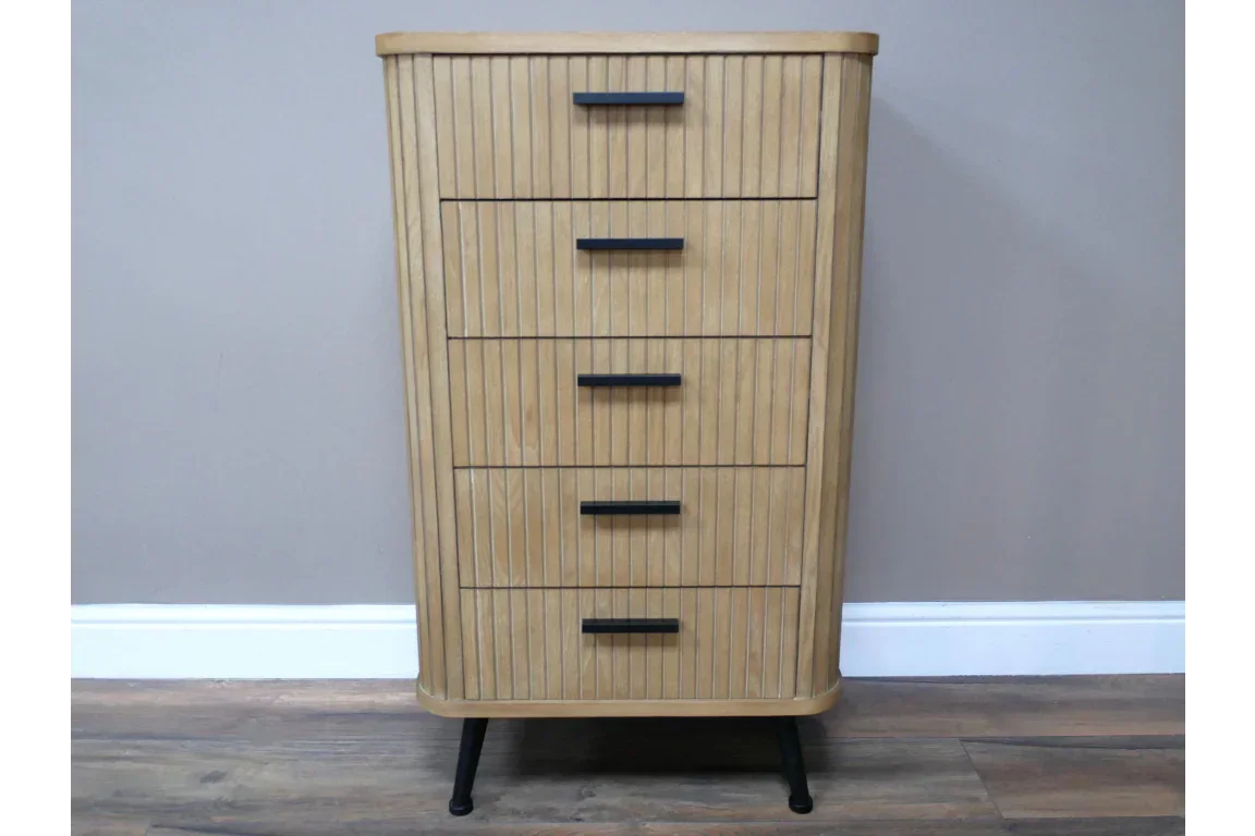 Wooden chest of drawers with vertical slats and black handles on angled legs
