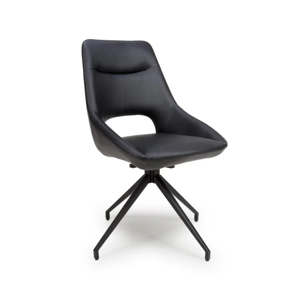 Black swivel dining chair with cut-out back and metal legs on white background