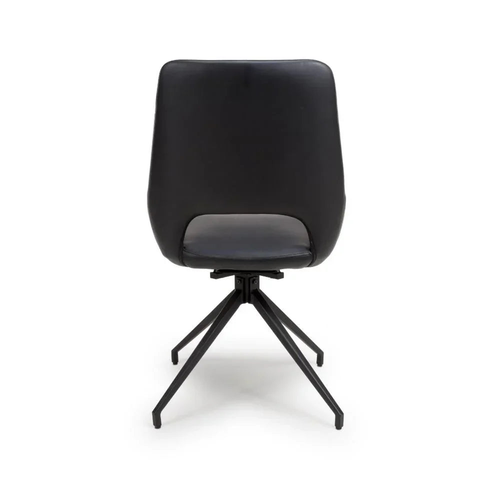 Black dining chair with metal legs and padded seat, rear view on white background