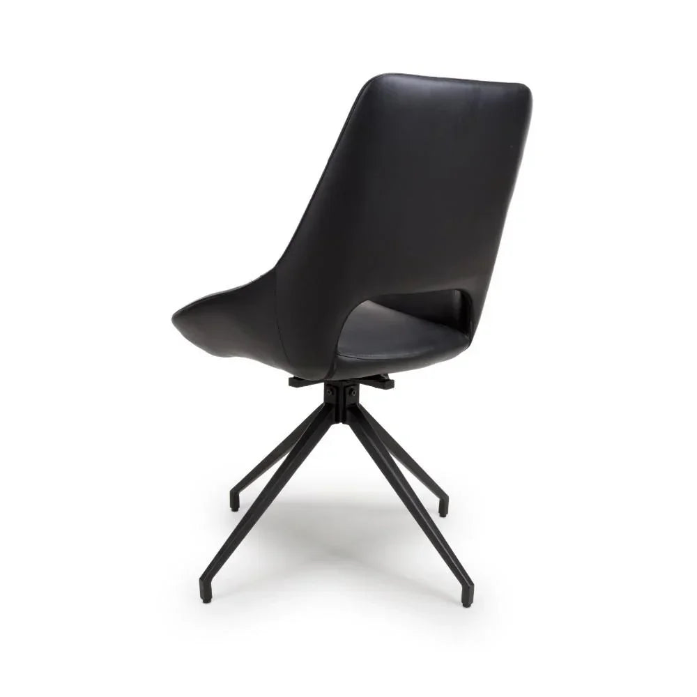 Black dining chair with metal legs, angled rear view highlighting curved backrest
