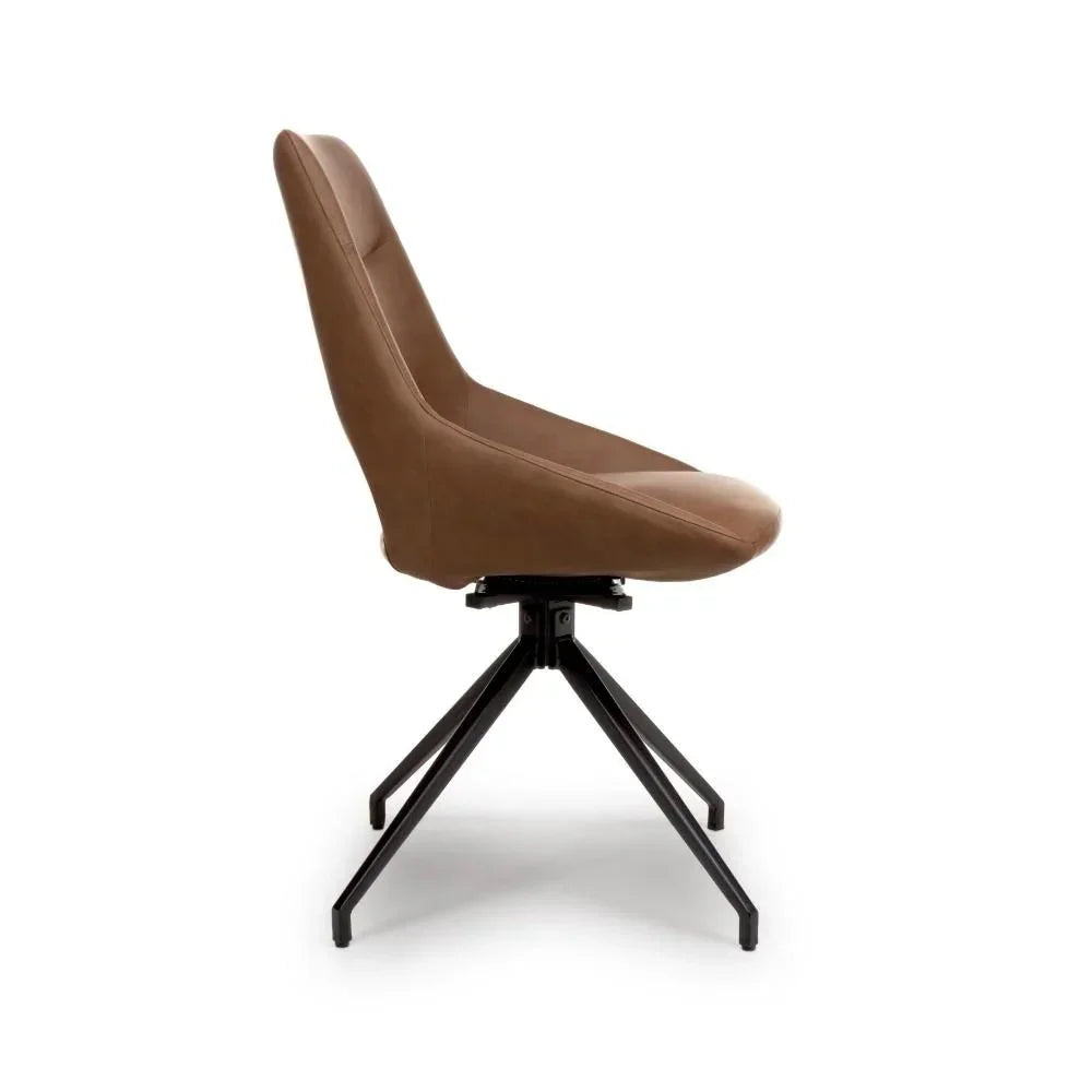 Tan dining chair with padded seat and black metal legs, side view