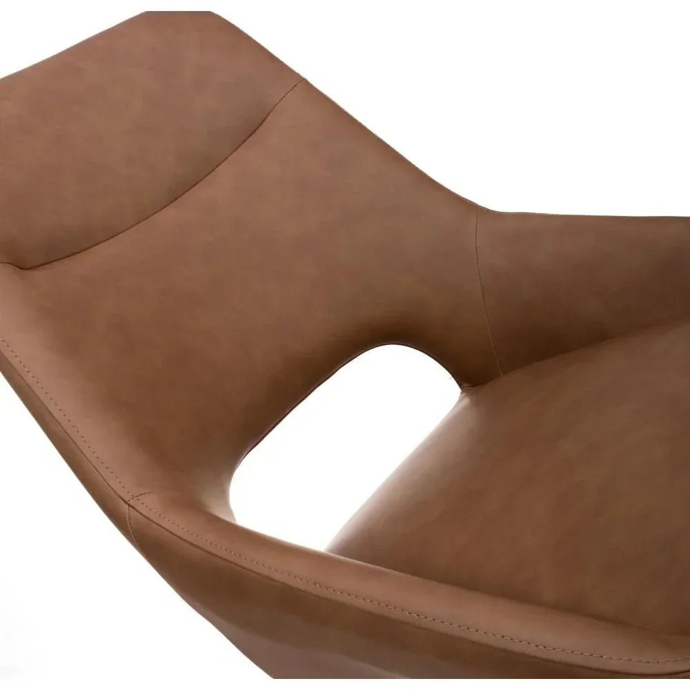 Tan faux leather dining chair seat with keyhole cutout and visible stitching closeup
