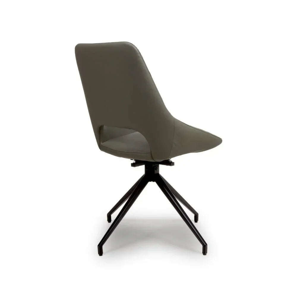 Taupe dining chair with swivel seat and black metal legs, rear angle view