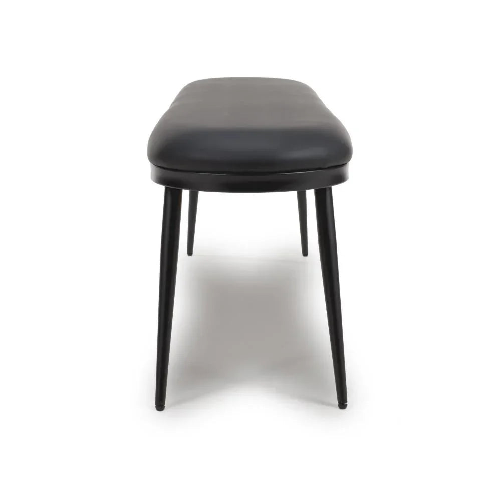 Black dining bench with padded seat and slim metal legs, front angle view