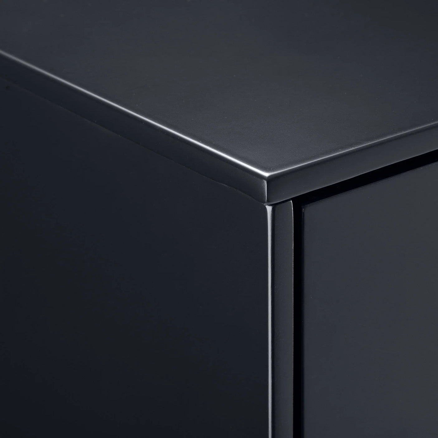 Anthracite five drawer chest corner detail showing smooth black finish