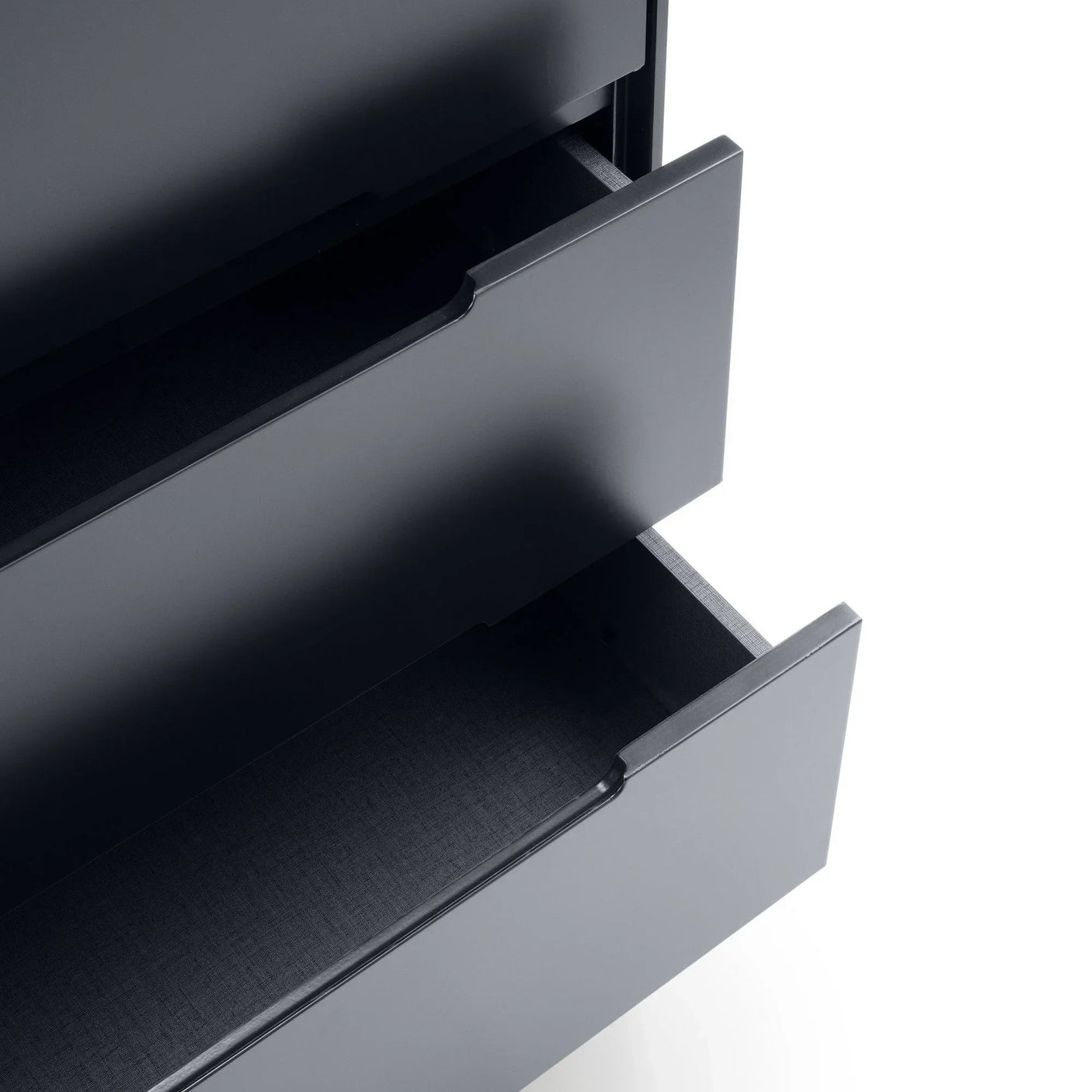 Anthracite 5 drawer chest close-up showing partially open drawers and sleek finish