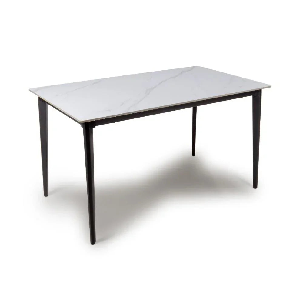 Rectangular dining table with white marble effect top and black tapered legs