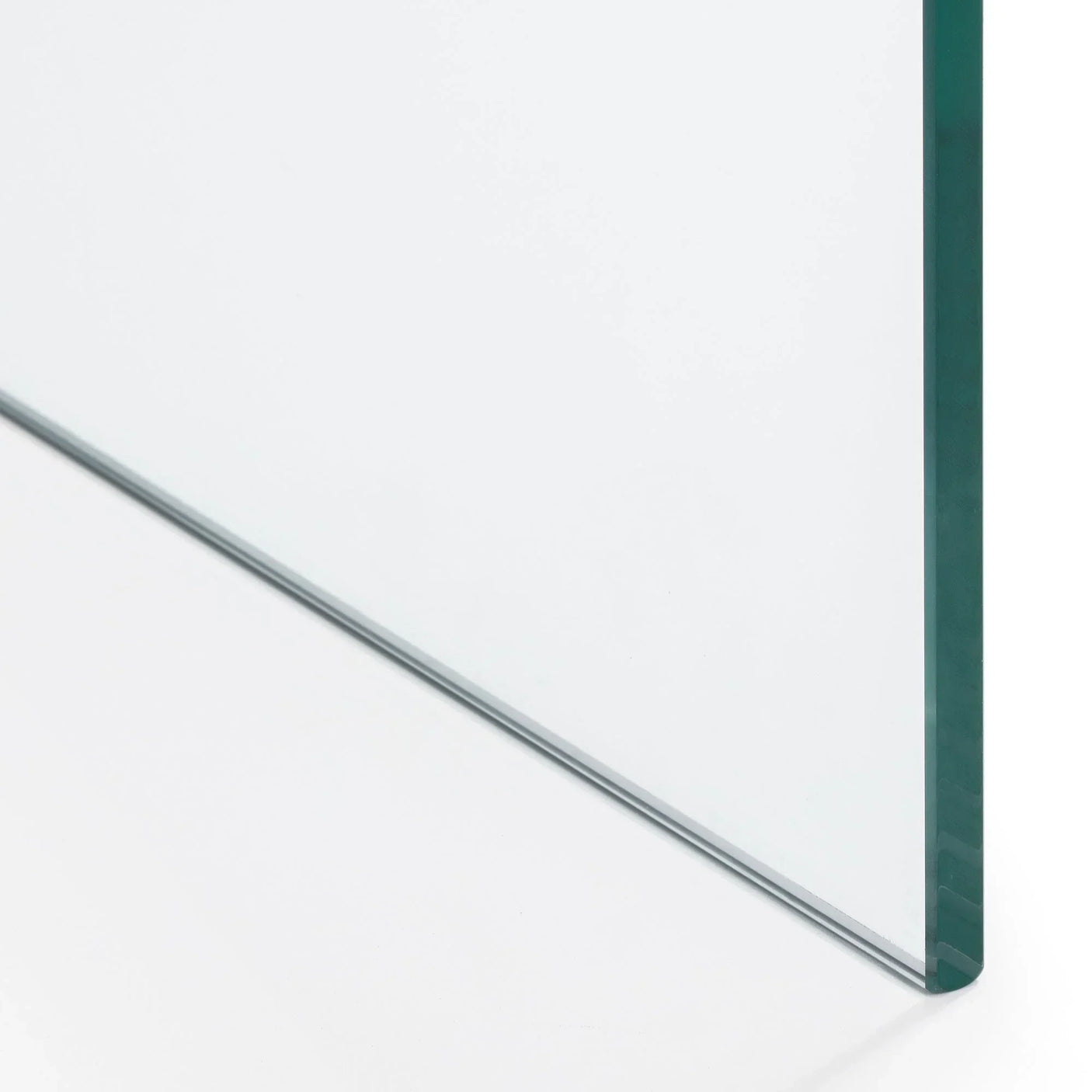 Clear glass desk top corner detail showing thickness and smooth edge