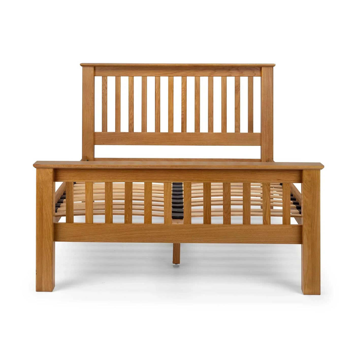 Front view of slatted oak bed frame with high headboard and footboard, wooden finish