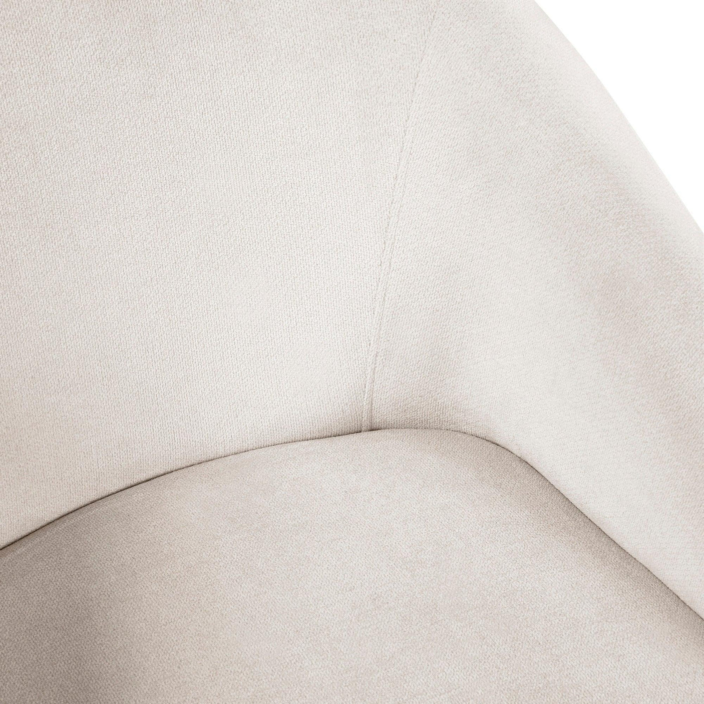 Close up of cream fabric armchair seat and curved backrest upholstery