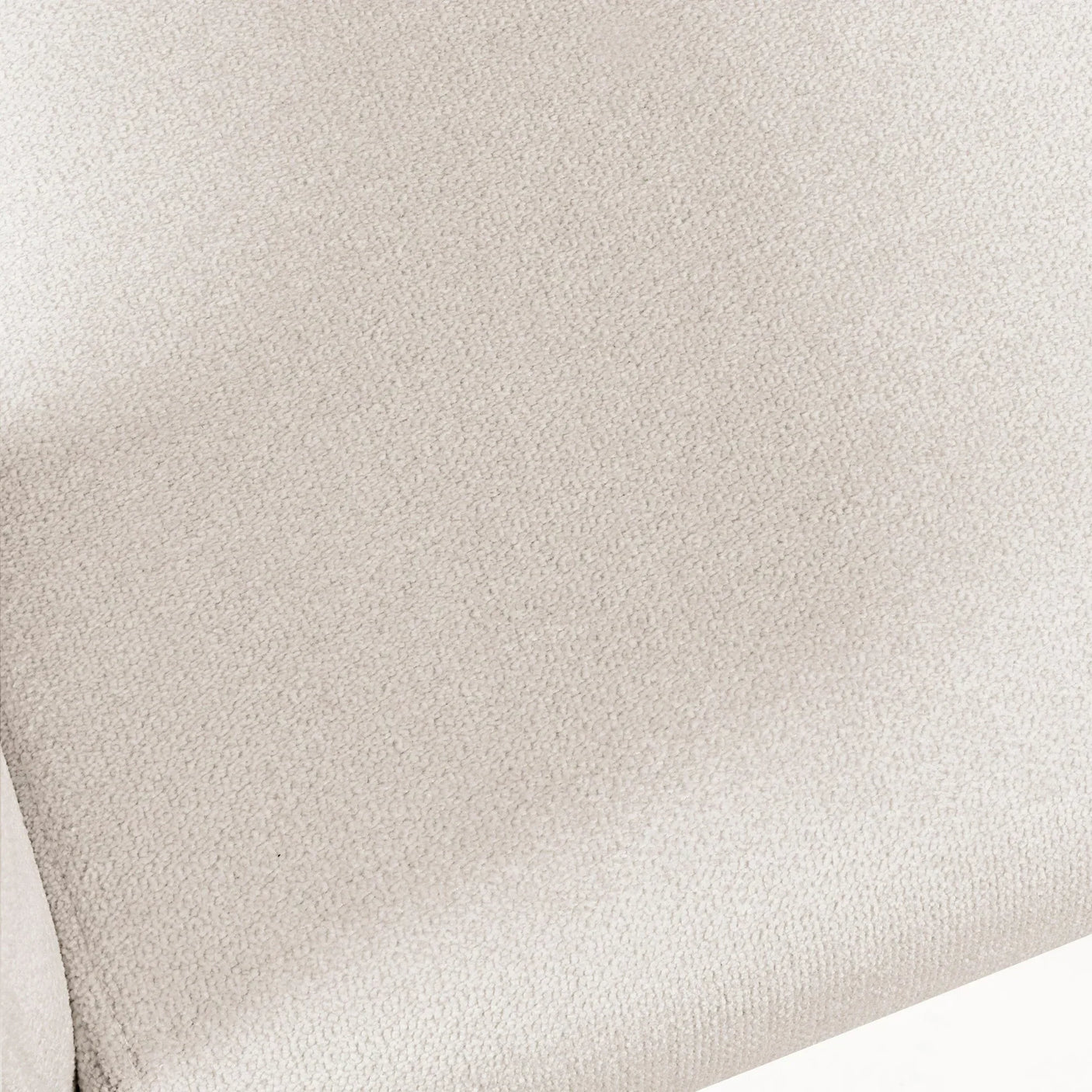 Close up of cream fabric upholstery on furniture seat cushion