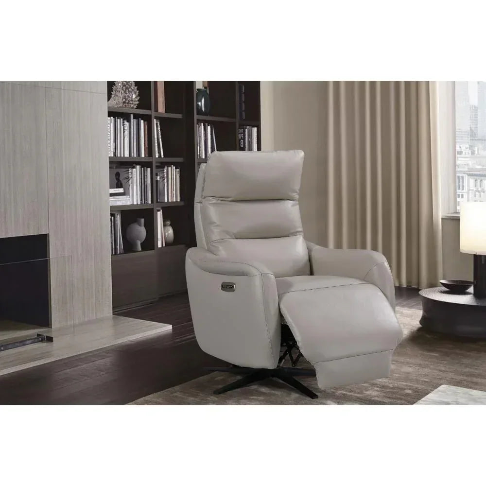 Light grey leather recliner chair with footrest in modern living room setting