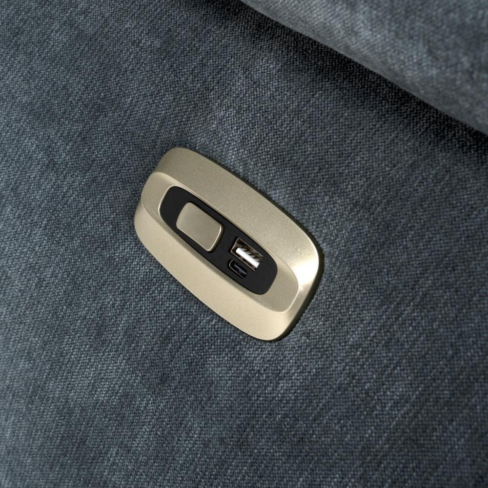 Closeup of fabric sofa arm with built-in USB and power recliner control