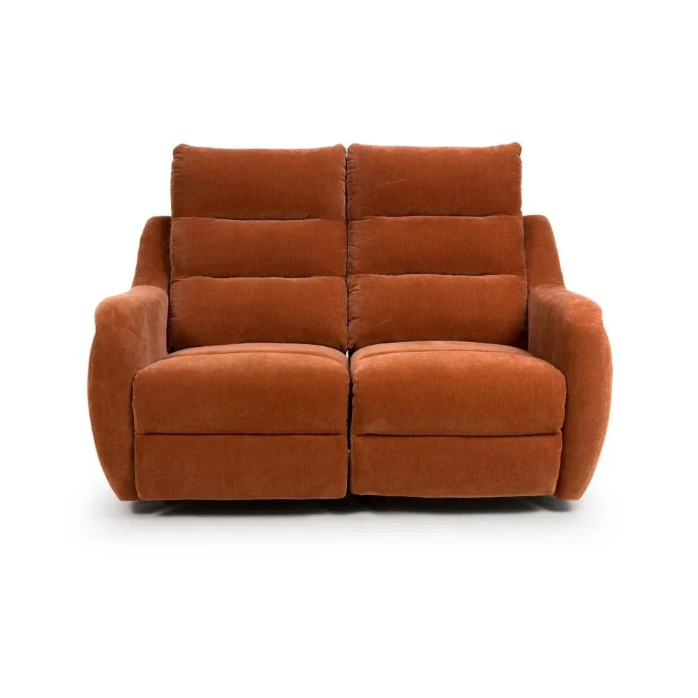 Rust fabric reclining sofa with padded armrests and high backrest, front view on white background