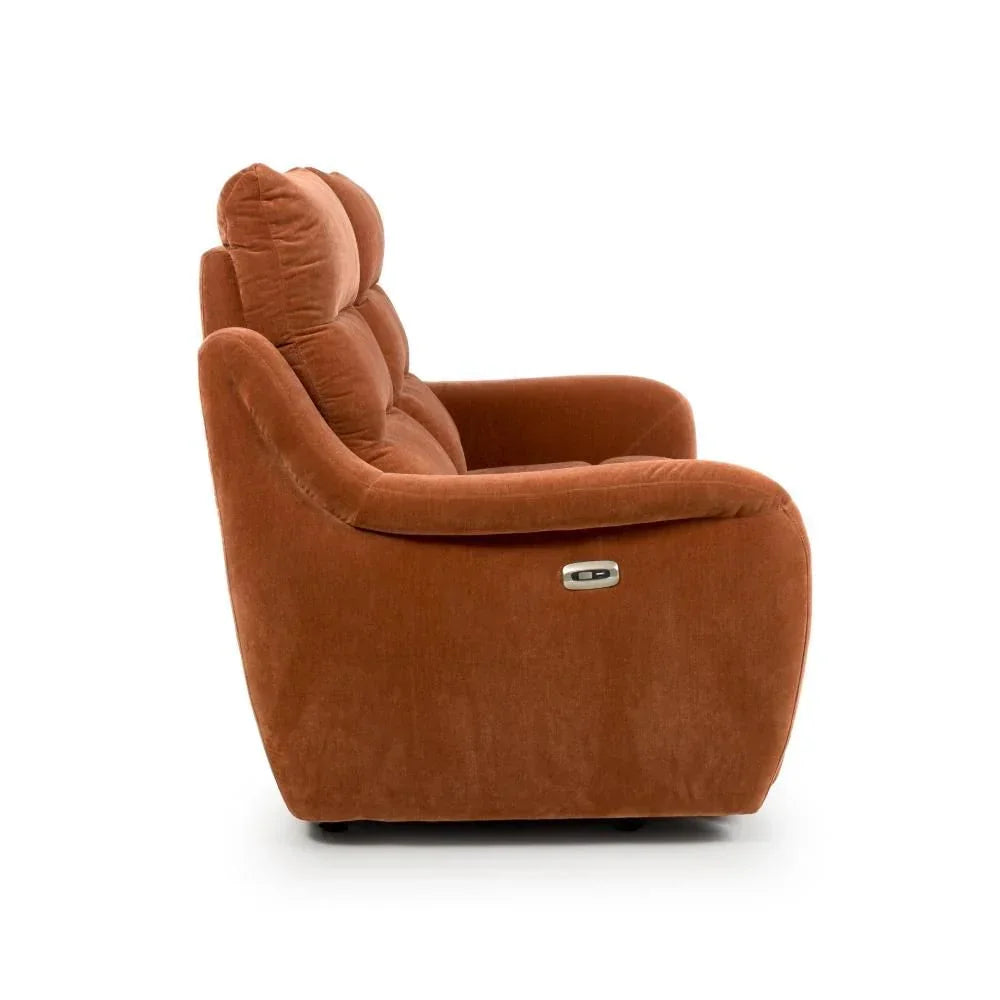 Side view of rust velvet recliner sofa with padded backrest and recline control