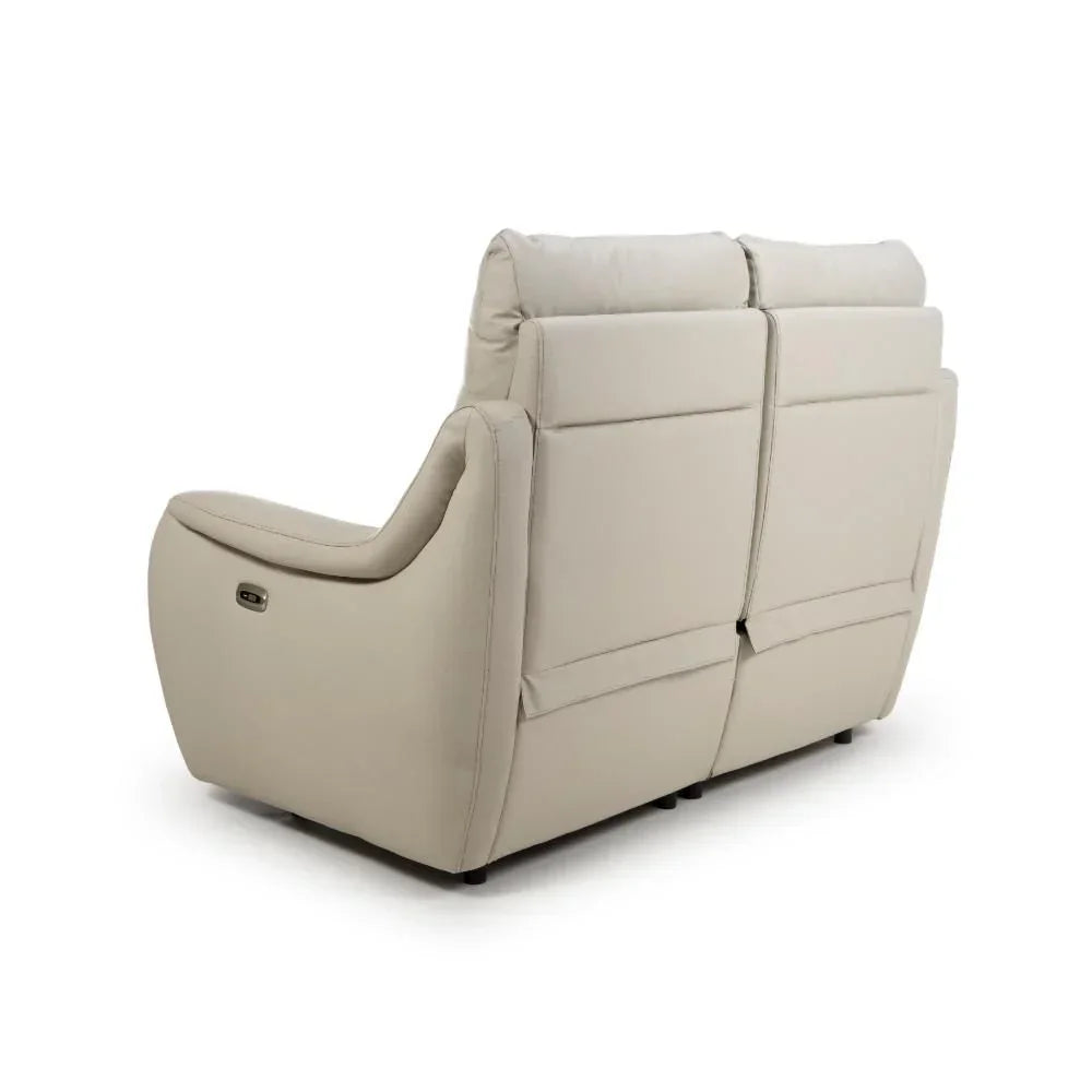 Beige leather recliner sofa rear view with padded backrests and armrests