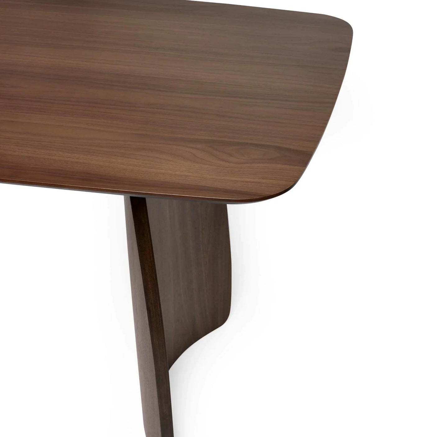 Walnut veneer dining table corner with rounded edge and angled wooden leg