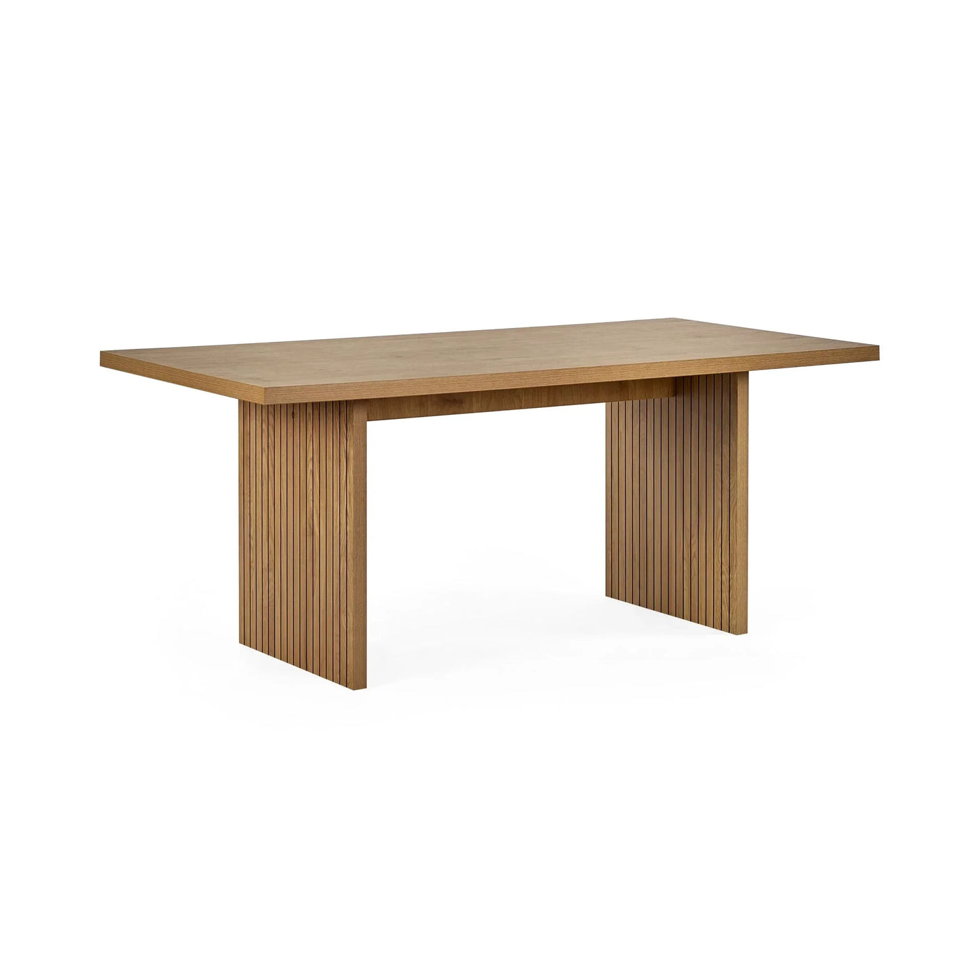 Rectangular wooden dining table with fluted panel legs and smooth top on white background