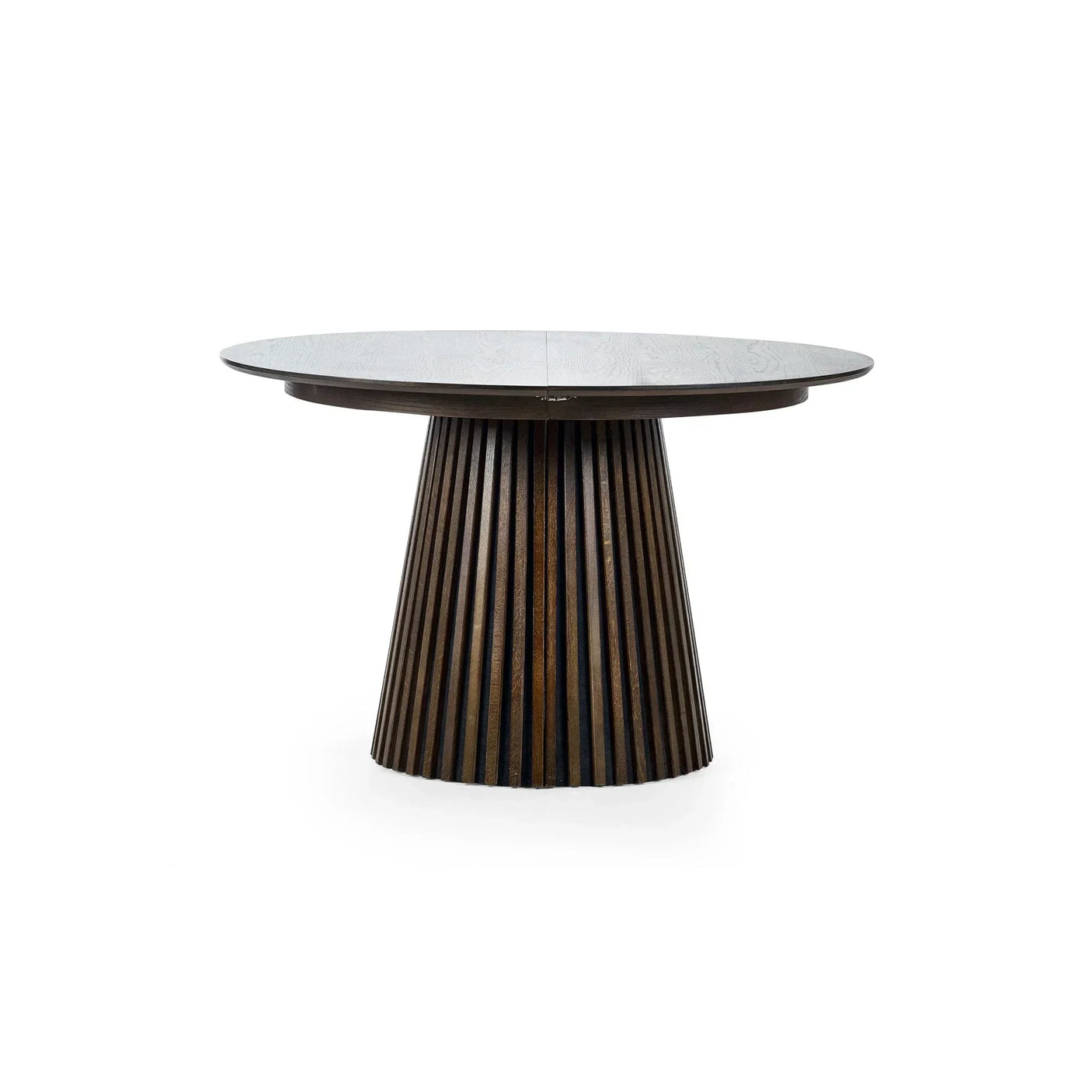 Round wooden dining table with fluted pedestal base on white background