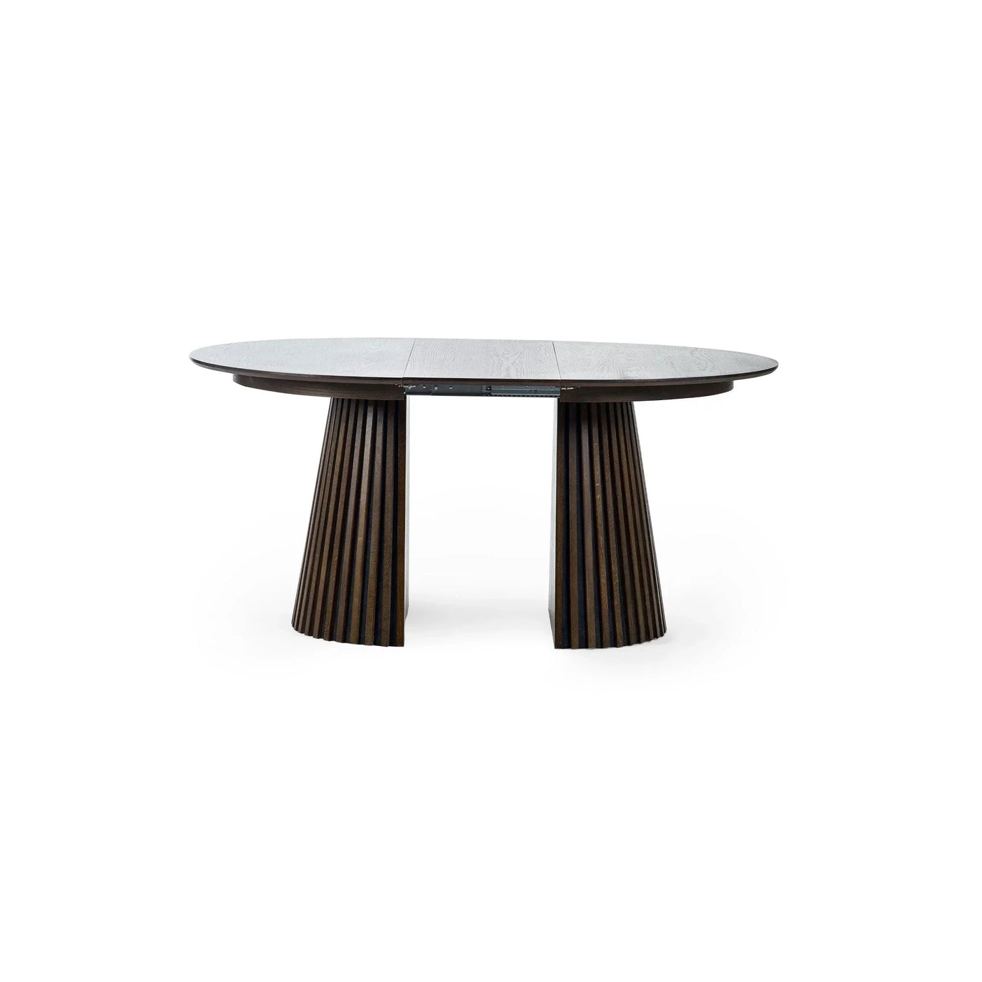 Oval dark wood dining table with fluted double pedestal base on white background
