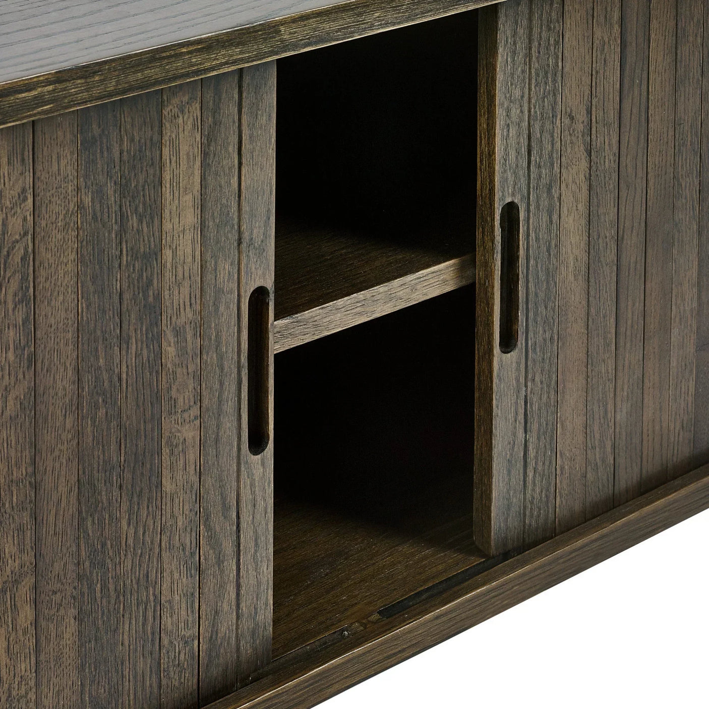 Dark wood sideboard with sliding doors and open shelf detail