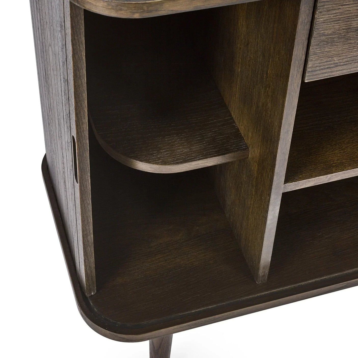 Dark wood sideboard shelving closeup showing curved shelf detail and vertical divider