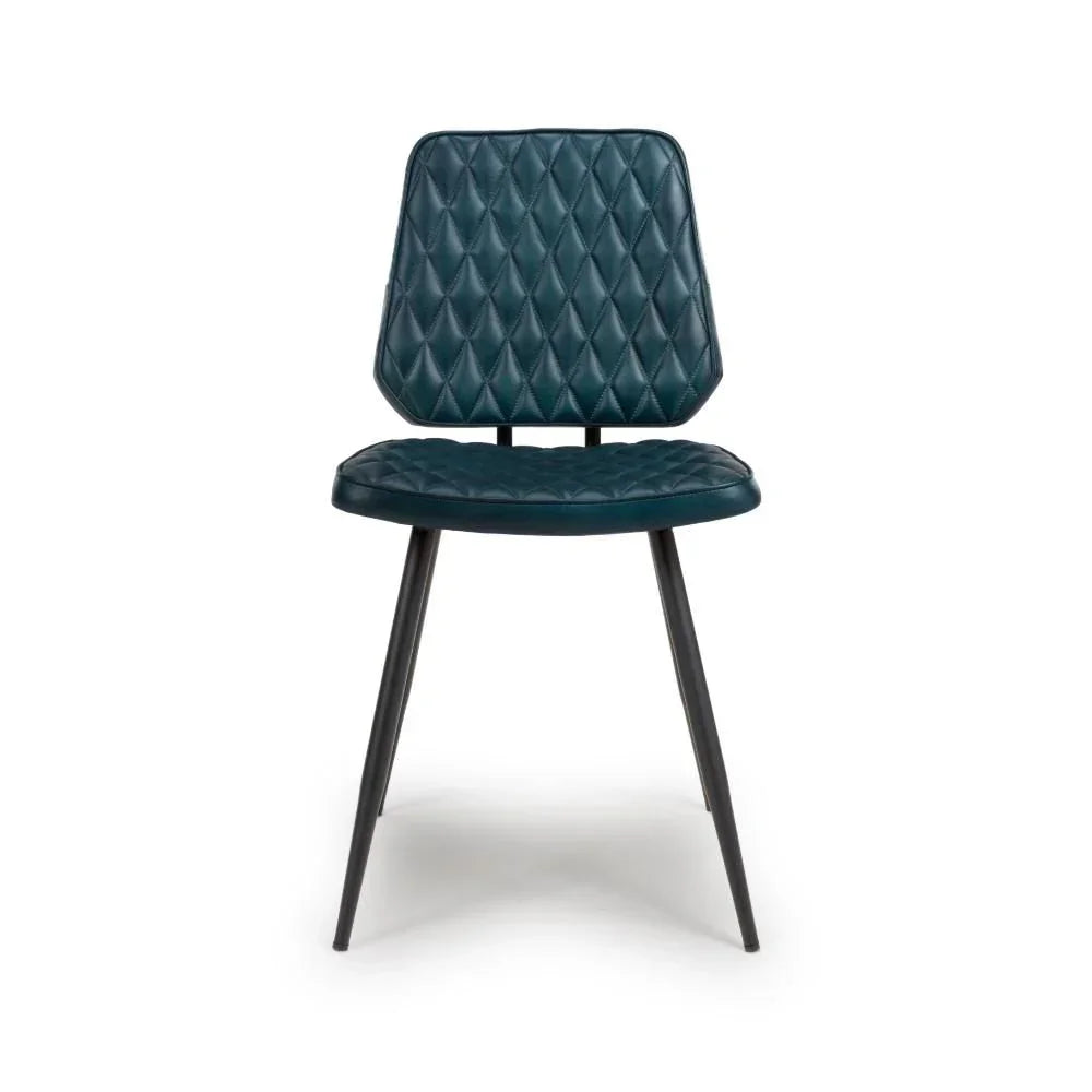 Blue quilted dining chair with metal legs, front view on white background
