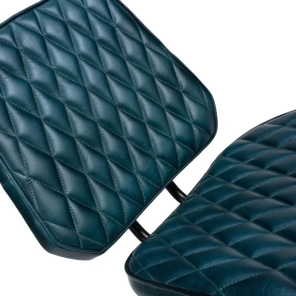 Quilted blue leather dining chair seat and backrest with diamond stitching detail