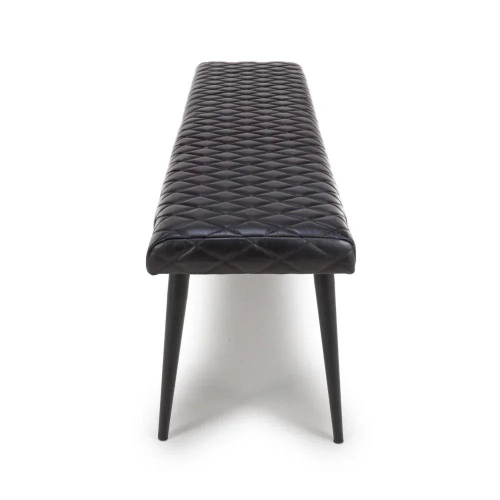 Black quilted dining bench with cushioned seat and angled legs, front view
