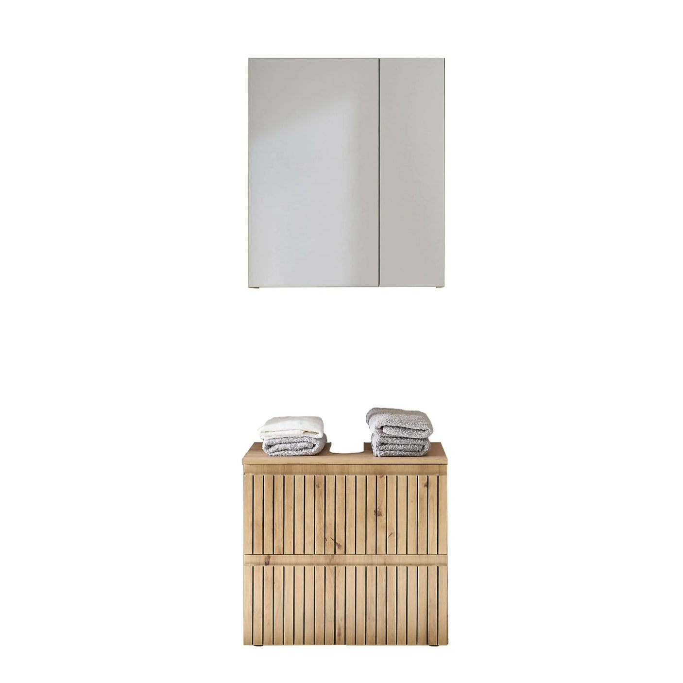 Modern bathroom storage cabinet and wooden laundry hamper with folded towels on top