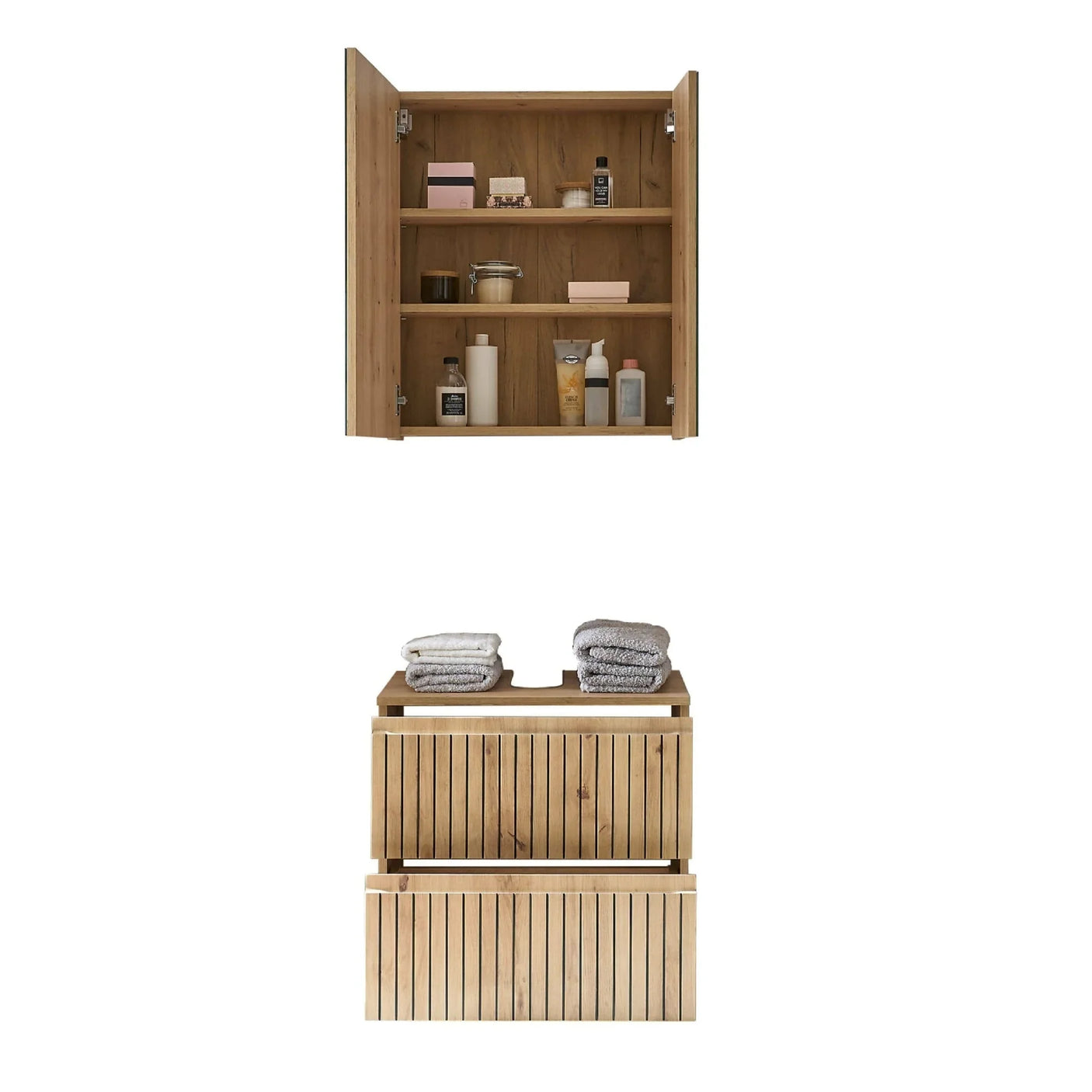 Oak bathroom storage unit with double door wall cabinet and slatted drawers, towels displayed on top