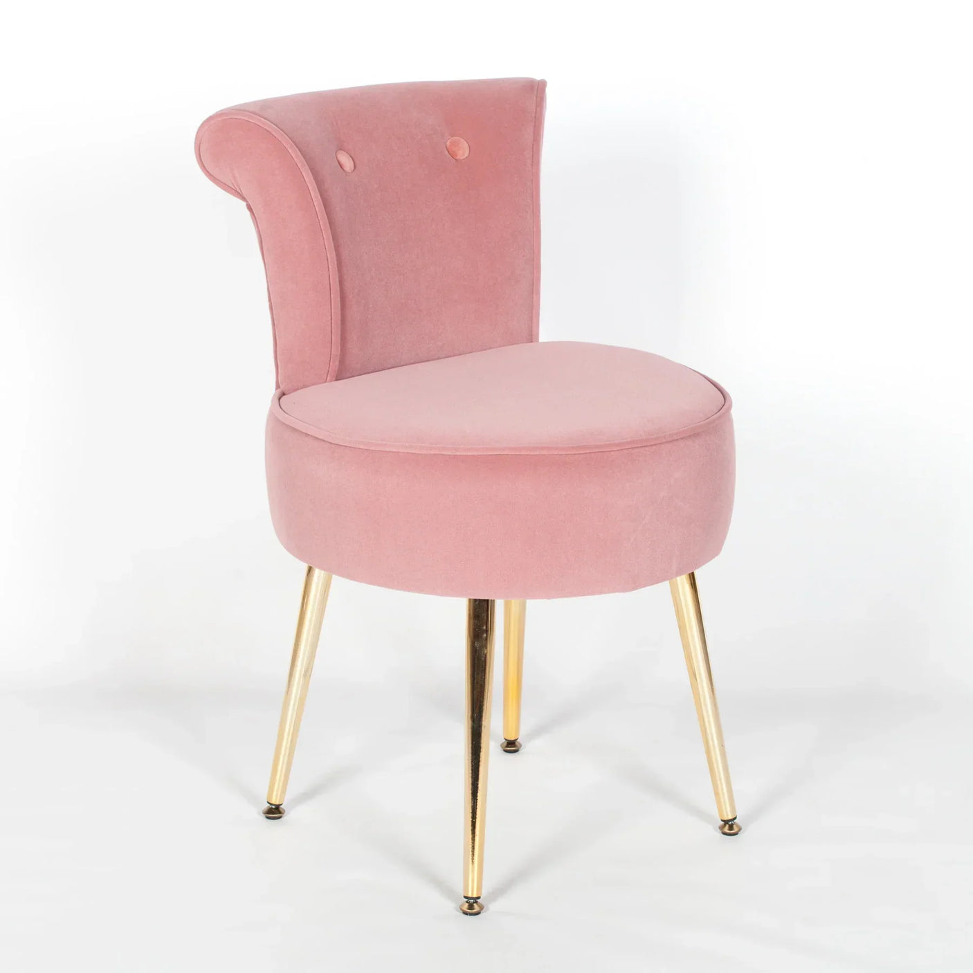 Pink velvet accent chair with curved backrest and gold metal legs